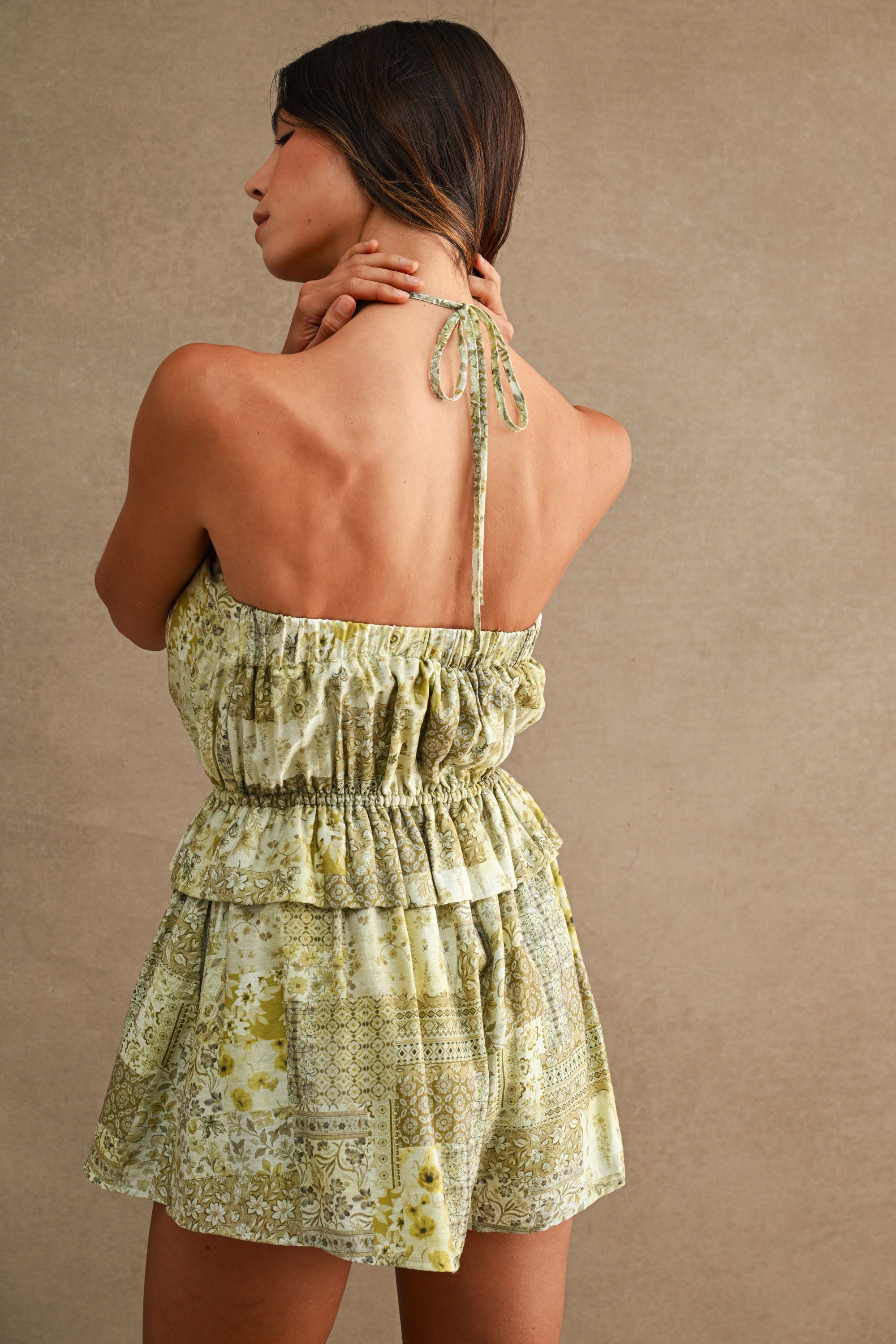 Green Printed Halter Romper With Elastic Waist And Ruffle Overlay